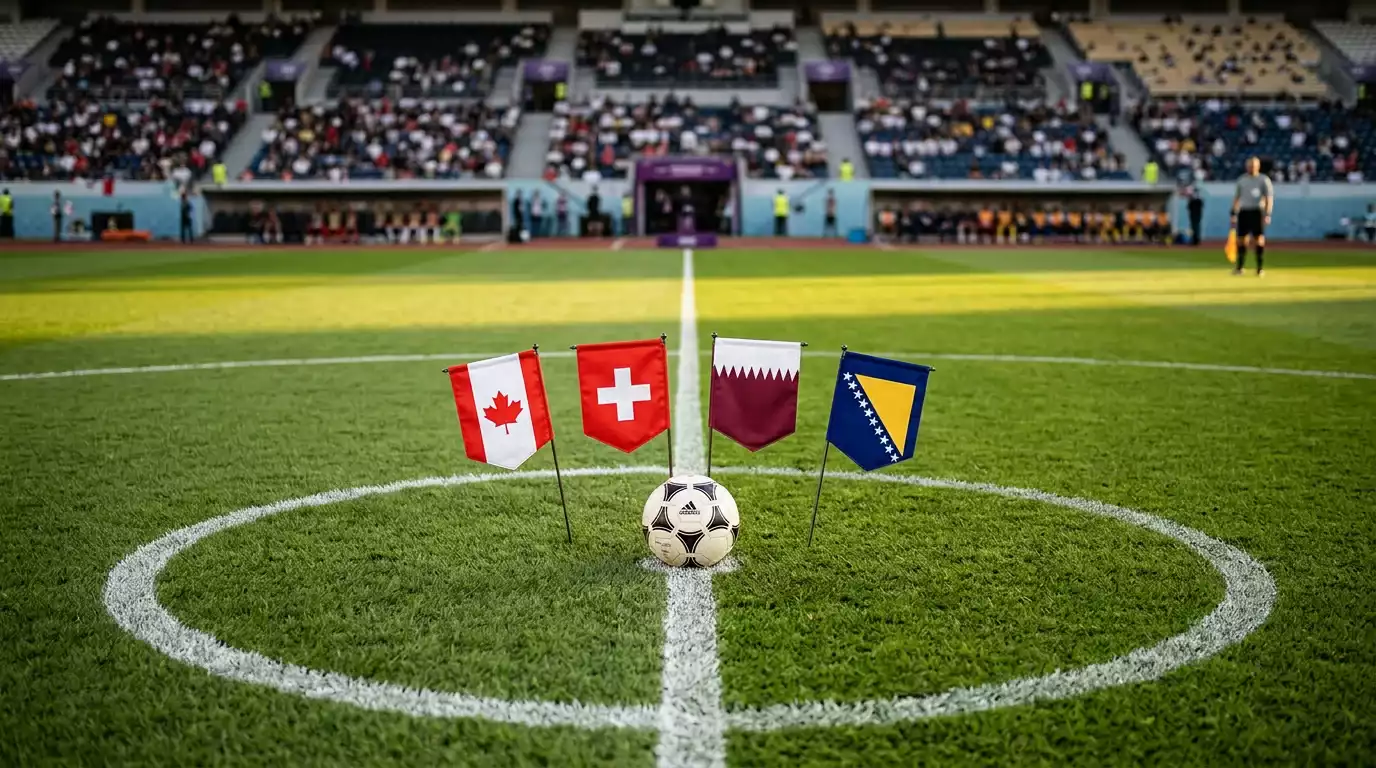 Quatre maillots posés côte à côte sur une table en bois clair, du rouge canadien au rouge à croix blanche suisse, en passant par le grenat qatarien et le bleu bosnien